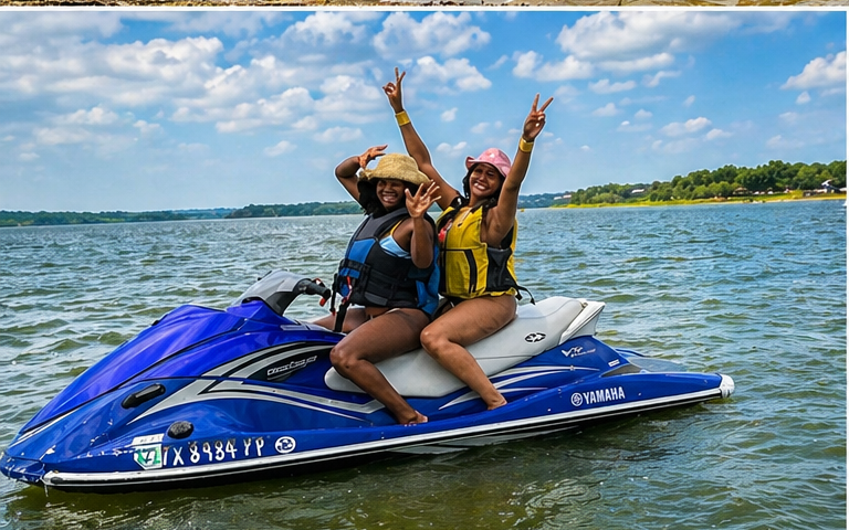 Two customers smiling on a Yamaha jet ski